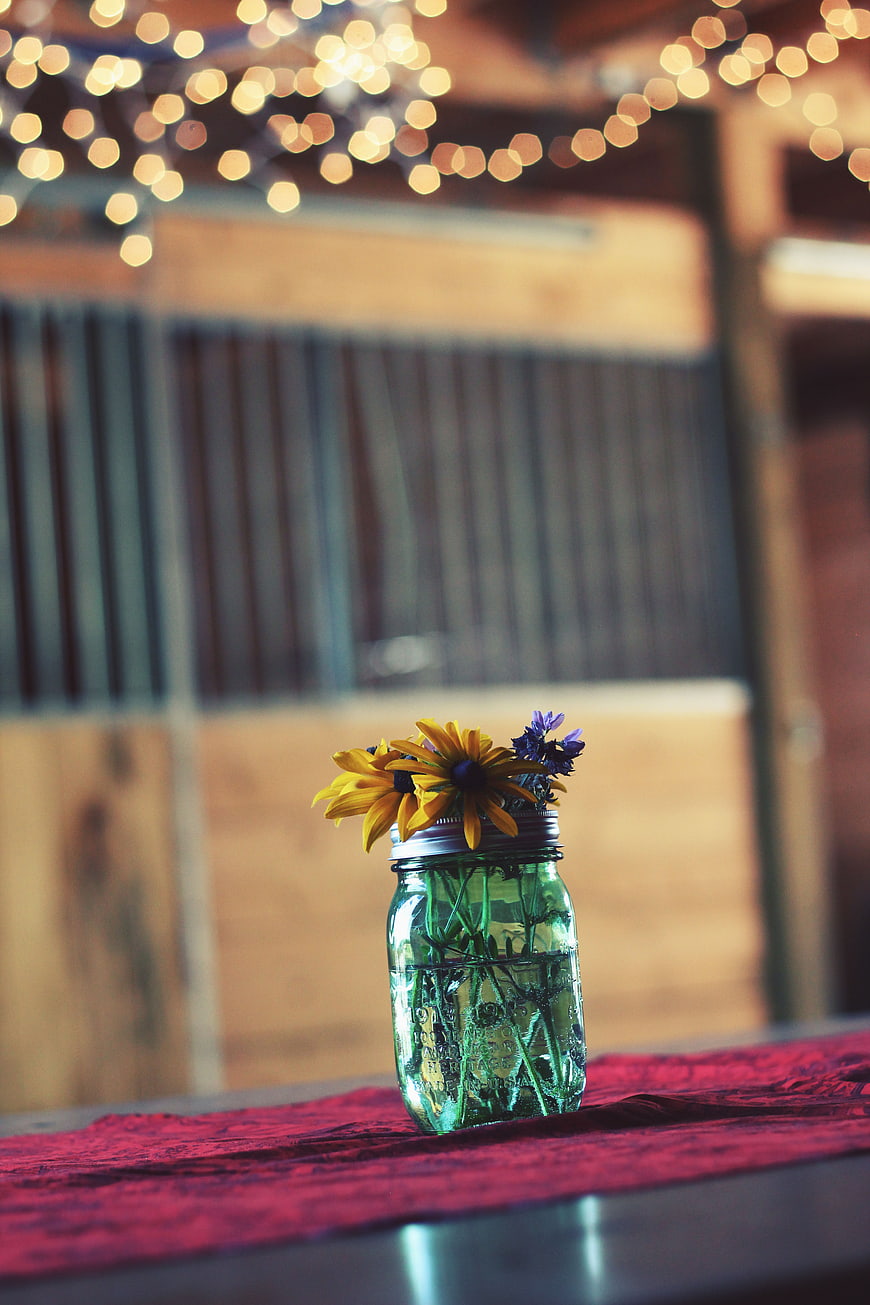Rustic Mason Jar Centerpiece with Wildflowers and Bokeh Lights