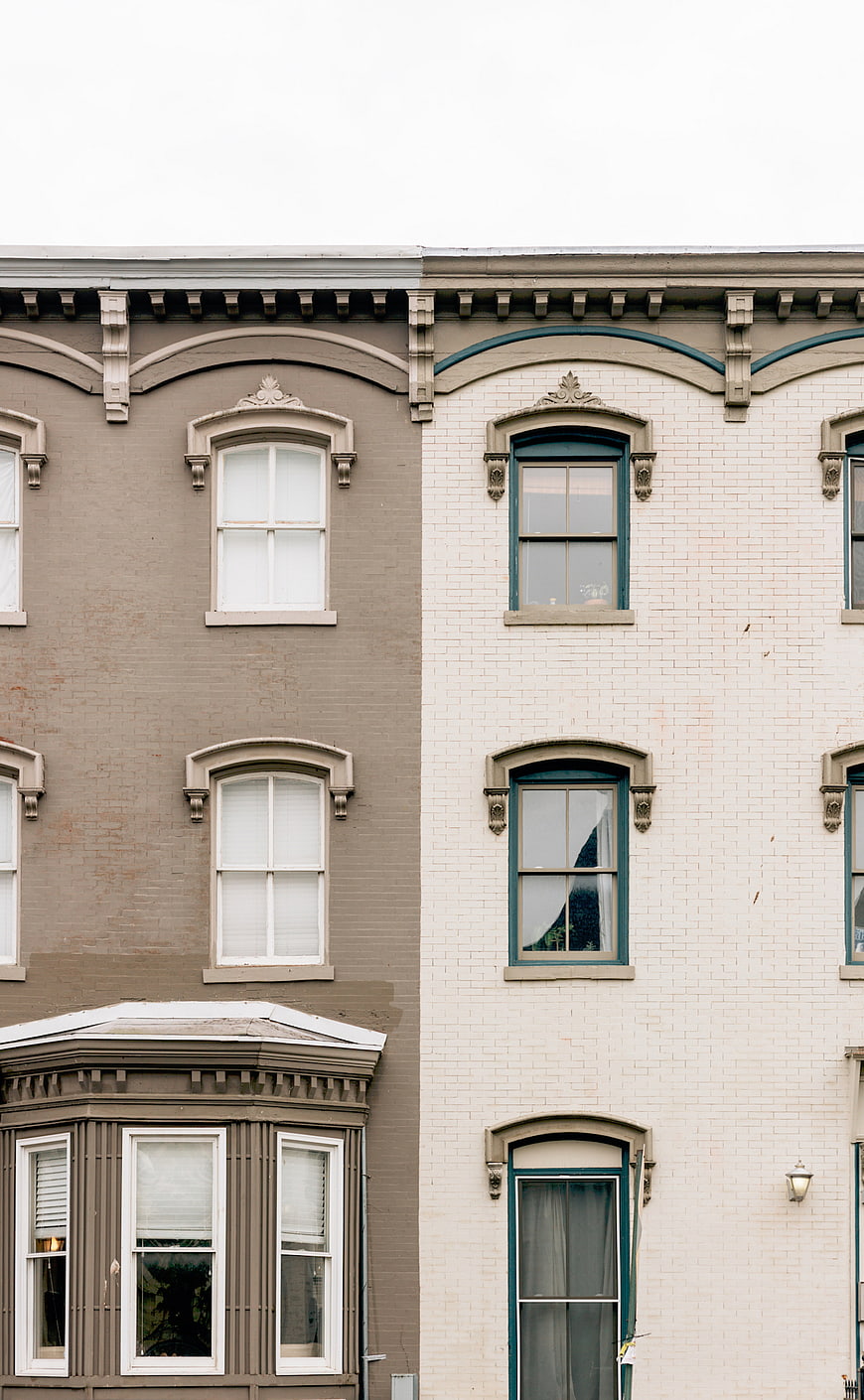 Classic Victorian Row Houses with Gray and White Brick Facades