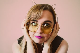 Woman with Cat Ear Headphones and Yellow Sunglasses