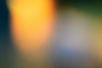 Abstract Blurred Background with Soft Yellow and Blue Light