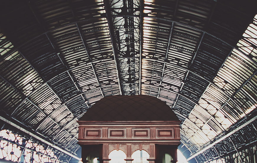 Low angle view of industrial metal roof structure