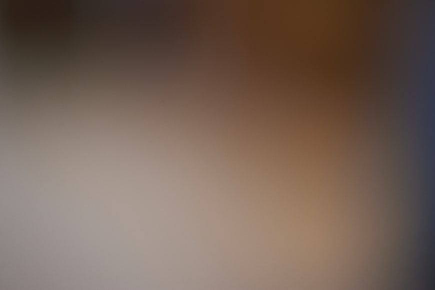 Abstract Blurred Gradient Background with Warm Brown and Gray Tones