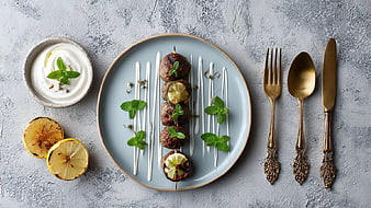 Top View Grilled Meat Skewers with Lemon and Mint