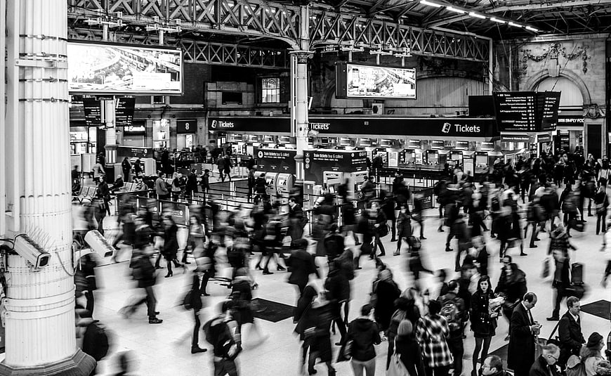 Crowded Victoria Station Interior with Motion Blur