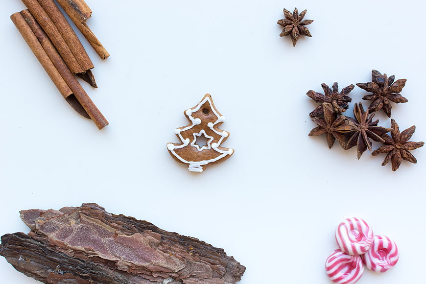 Christmas gingerbread cookie with cinnamon and peppermint candies