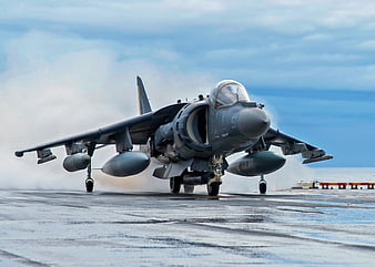 AV-8B Harrier Jet Landing on Aircraft Carrier Deck