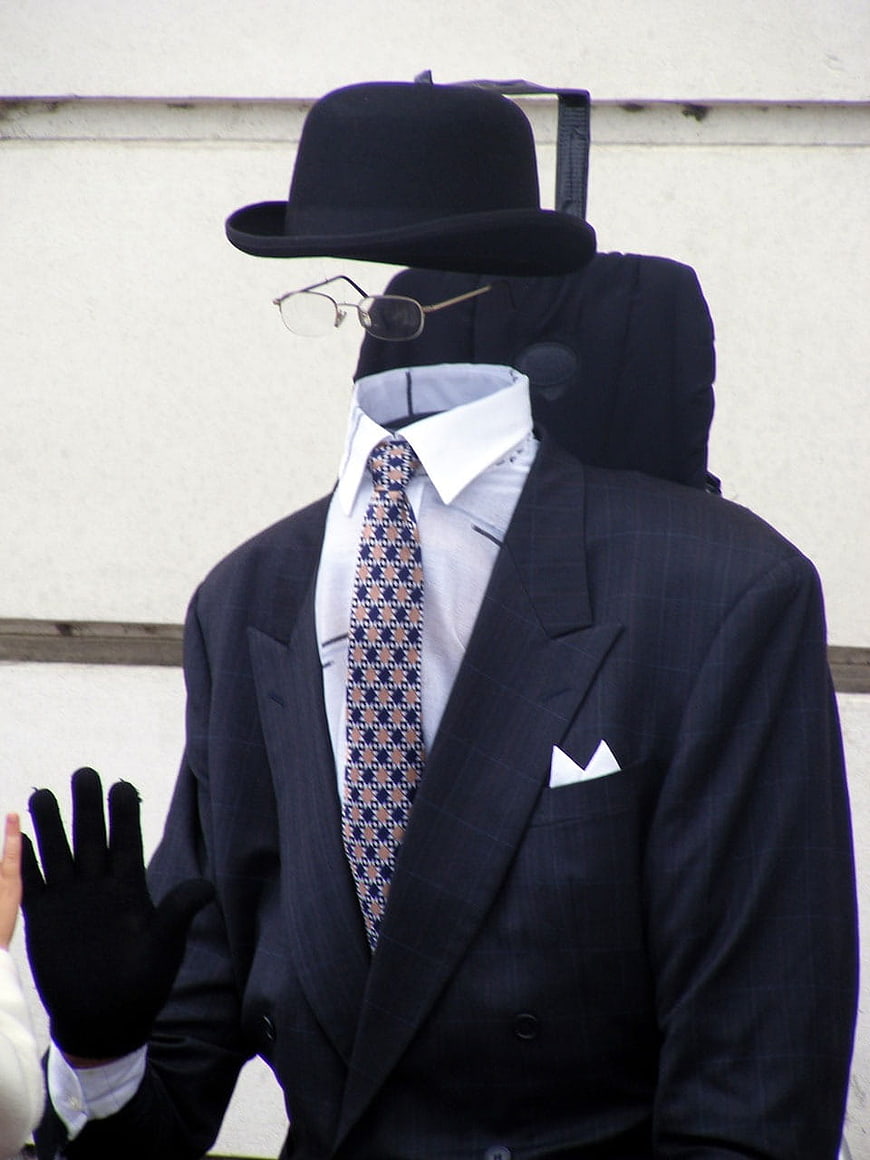 Invisible Man Concept With Bowler Hat, Suit, And Glasses