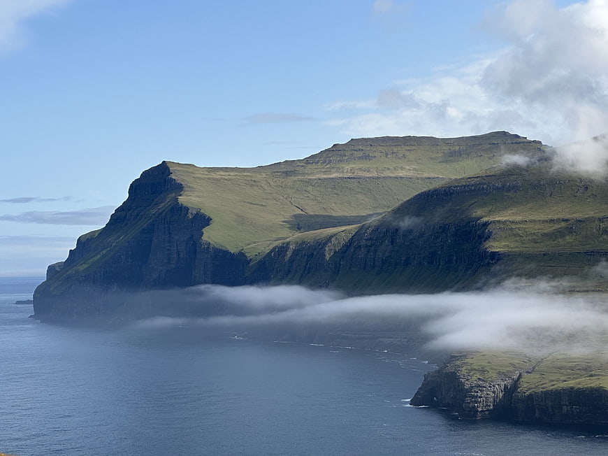 Misty Green Cliffs Overlooking the Ocean