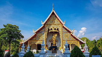 Golden Thai Temple Architecture with Buddha Statue