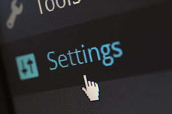 Close-up of Settings Menu on Digital Screen with Cursor