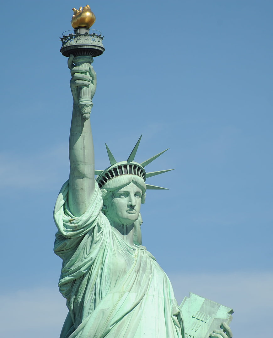 Statue of Liberty Close-Up Against Blue Sky
