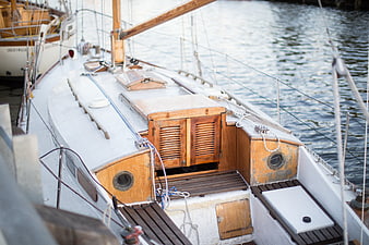 Classic Wooden Sailboat Deck Detail in Harbor