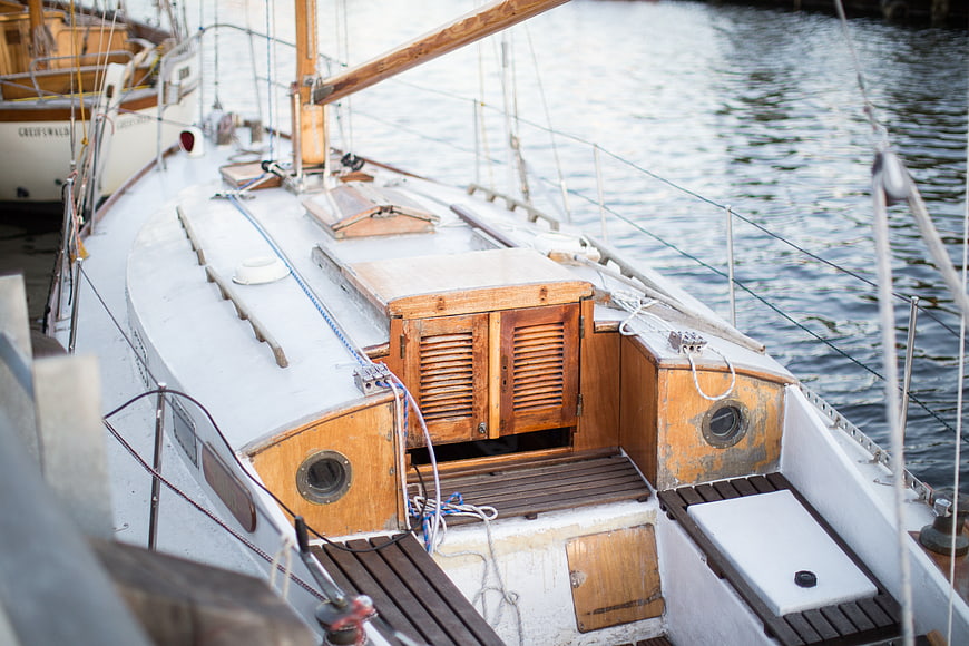 Classic Wooden Sailboat Deck Detail in Harbor