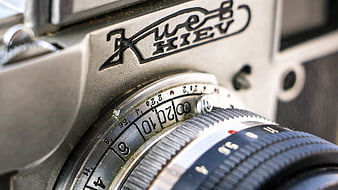 Close-up of vintage Kiev film camera lens and body