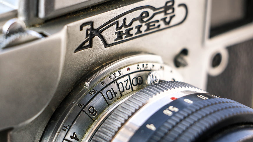 Close-up of vintage Kiev film camera lens and body