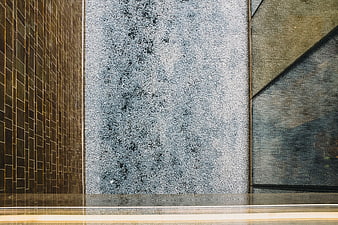 Abstract architectural wall textures with tiles and concrete