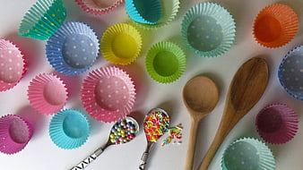 Colorful Cupcake Liners and Wooden Spoons Flat Lay