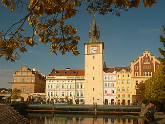 Historic Prague Town Hall Tower and Vltava River in Autumn