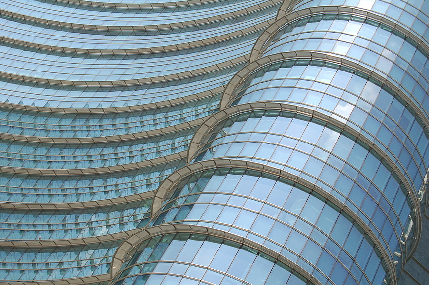 Curved glass facade of modern office building