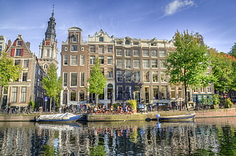 Amsterdam Canal Houses and Church Tower Reflection
