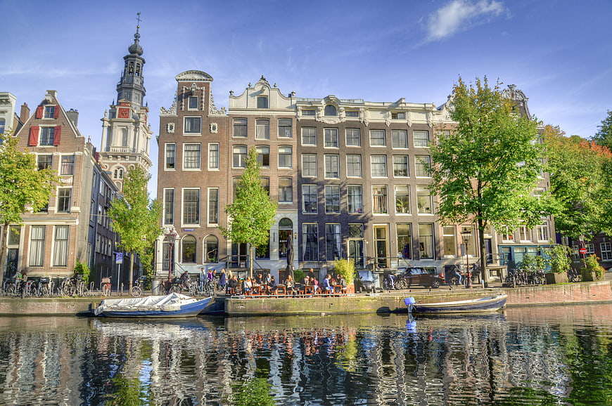 Amsterdam Canal Houses and Church Tower Reflection