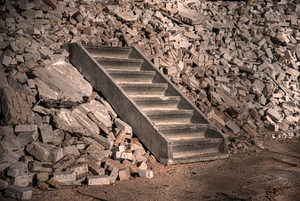 Concrete Staircase Amidst Construction Rubble and Debris