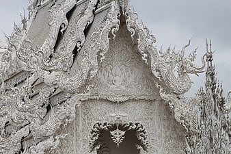 Intricate White Temple Architecture Detail in Chiang Rai