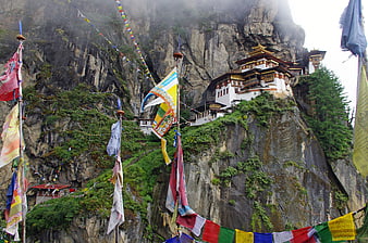 Taktsang Monastery on Cliffside in Bhutan with Prayer Flags