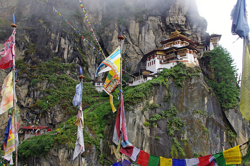 Taktsang Monastery on Cliffside in Bhutan with Prayer Flags