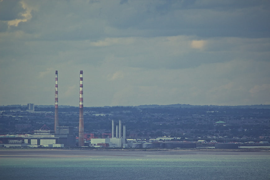 Industrial Power Plant Chimneys by the Water