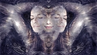 Surreal mirrored portrait of a woman with closed eyes and ethereal wings