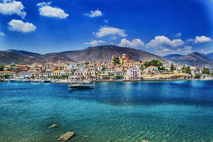 Galaxidi Town Coastline With Turquoise Aegean Sea And Yacht