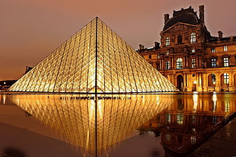 Illuminated Louvre Pyramid Reflection at Night