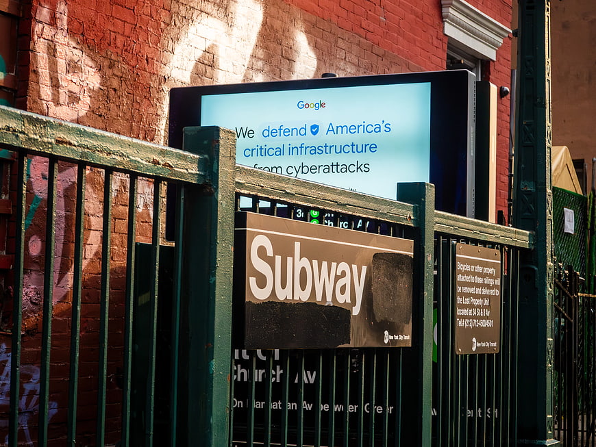 Subway Entrance with Google Cybersecurity Advertisement