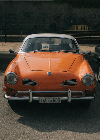Front view of vintage orange Volkswagen Karmann Ghia