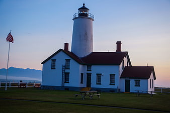 New Dungeness Lighthouse at Dusk with American Flag