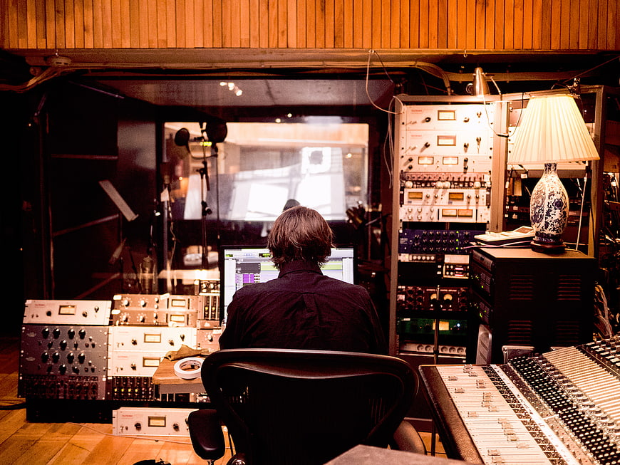 Music Producer Working in Vintage Recording Studio