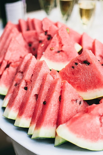 Fresh Sliced Watermelon Wedges on White Plate