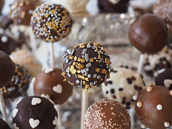 Assorted Chocolate Cake Pops with Gold and Silver Sprinkles