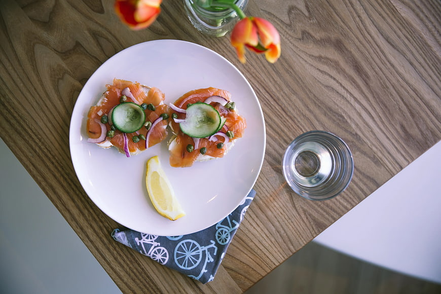 Smoked Salmon Bruschetta on White Plate with Lemon
