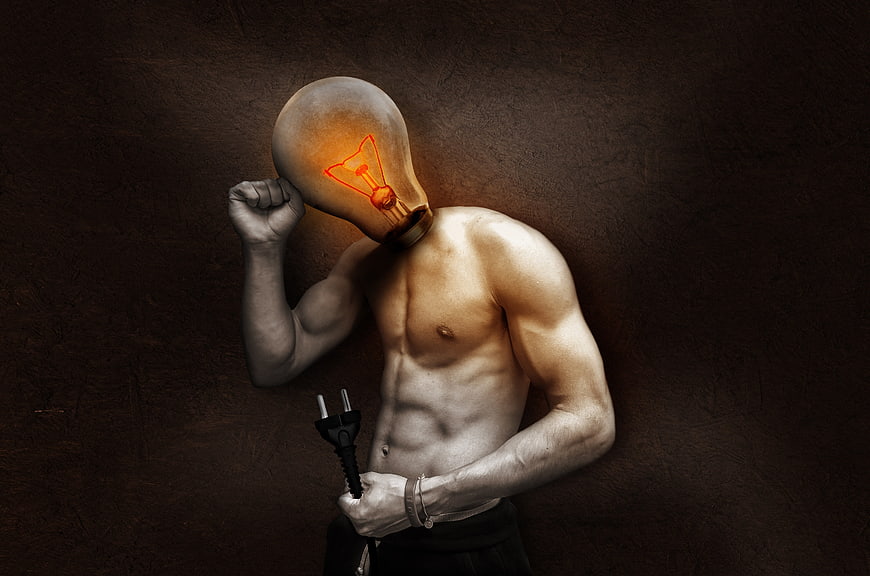 Surreal muscular man with light bulb head holding plug