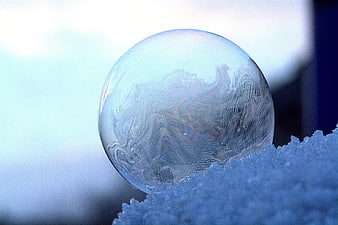 Close-up of Frozen Ice Sphere on Snow