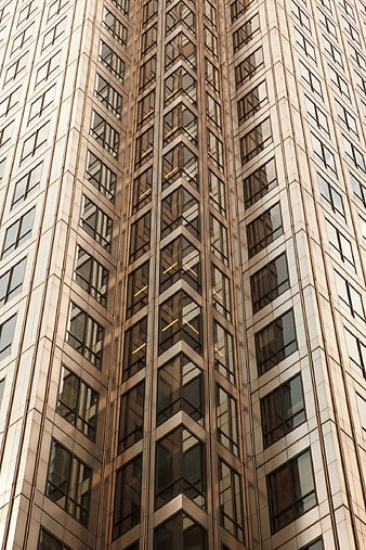 Modern Skyscraper Facade with Geometric Window Patterns