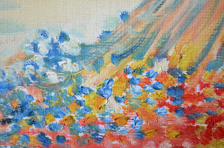 Close-up of colorful impasto oil painting texture with thick brushstrokes
