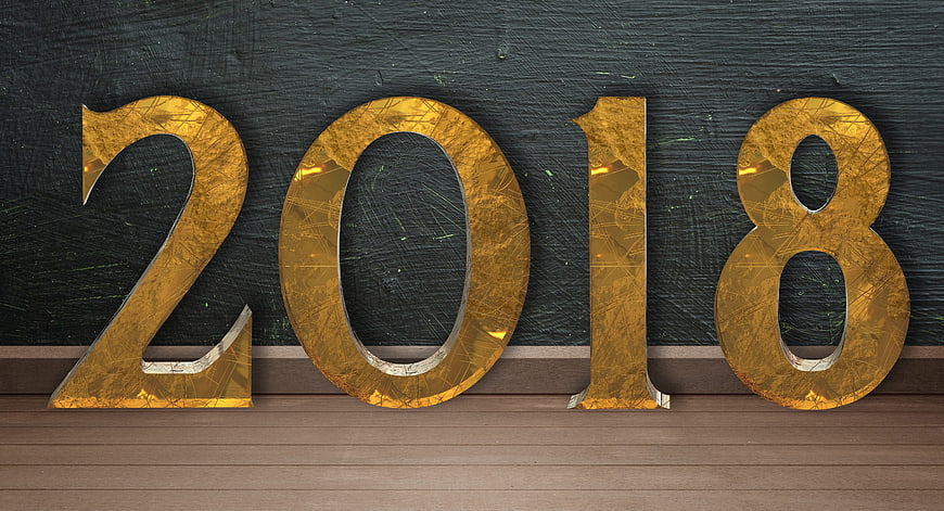 Golden 2018 Numbers on Dark Wood Background
