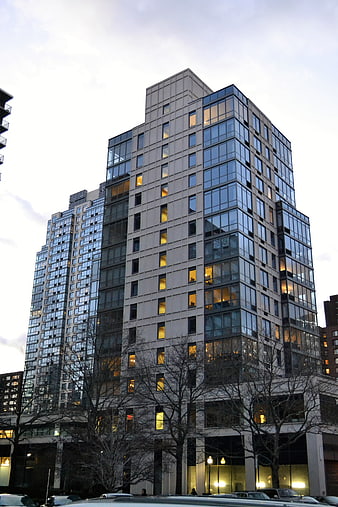 Modern High-Rise Apartment Building at Dusk