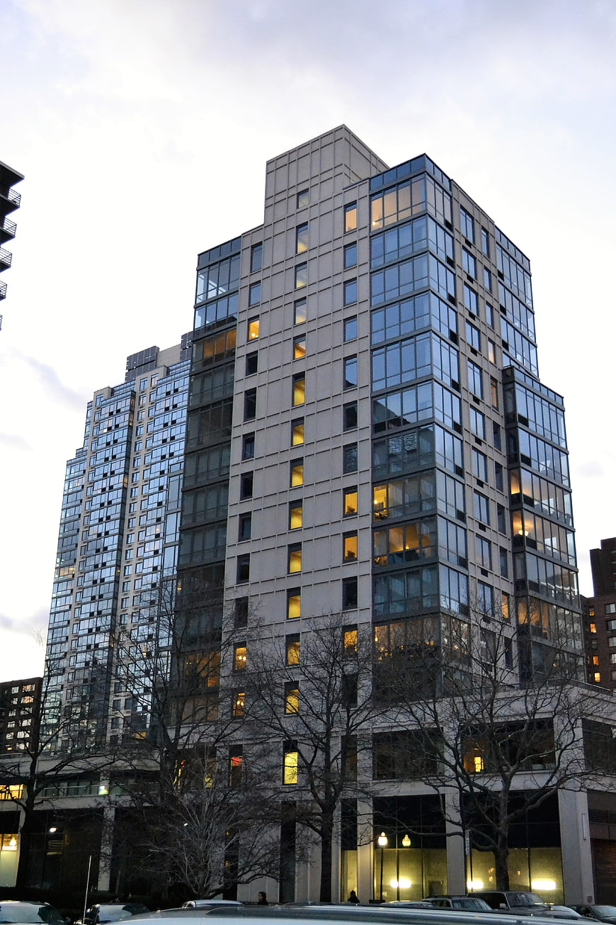 Modern High-Rise Apartment Building at Dusk