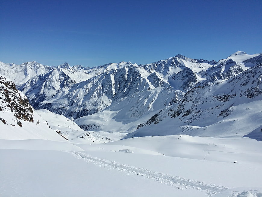 Snowy Mountain Range Landscape with Blue Sky