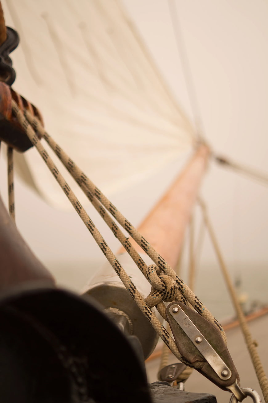 Close-up of sailing ship ropes and pulley mechanism
