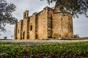 Low angle view of ancient stone church in Cyprus